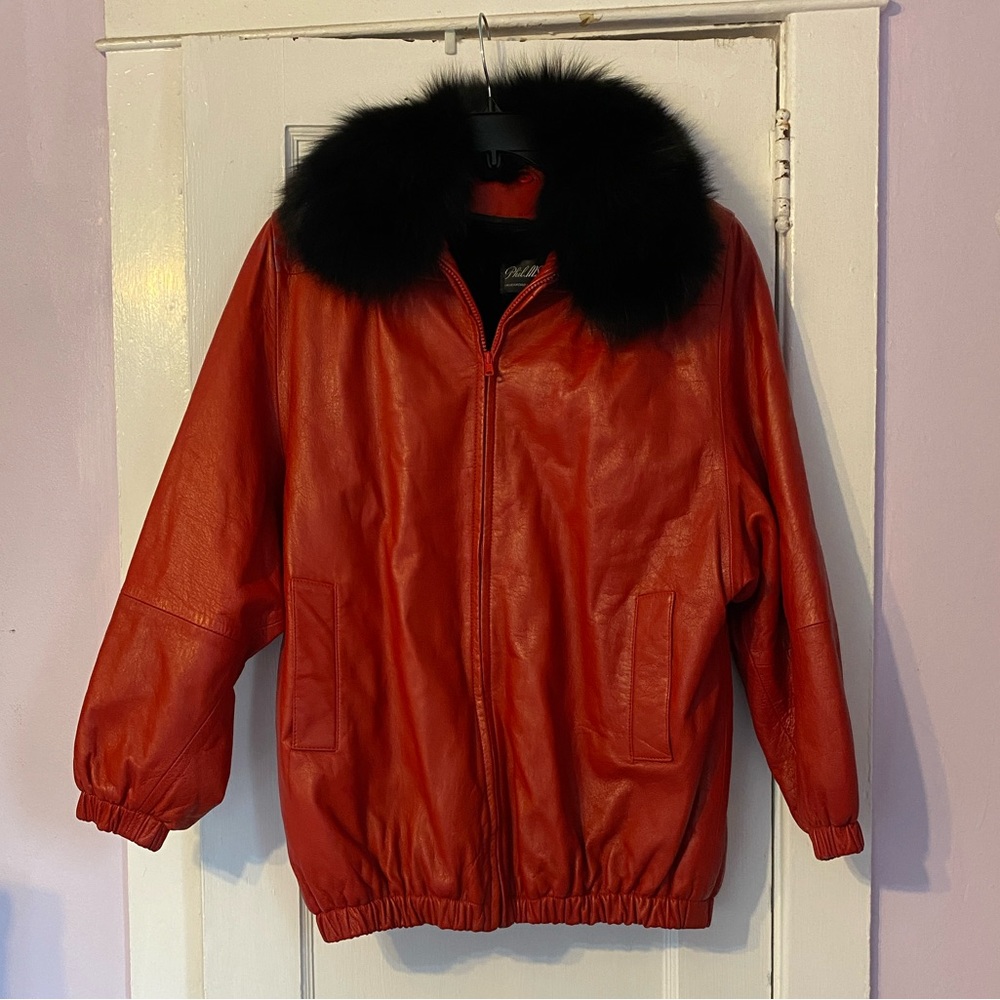 Phil M Stupp red leather coat with real fur lining.